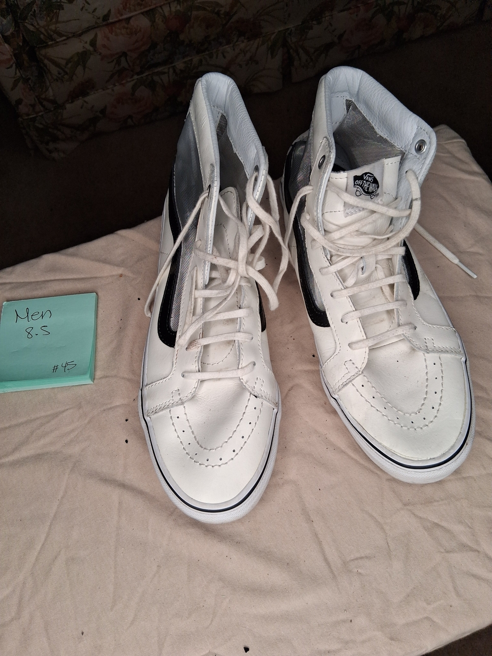 Classic Vans Sk8-Hi high-top sneakers in white leather with the iconic black sid